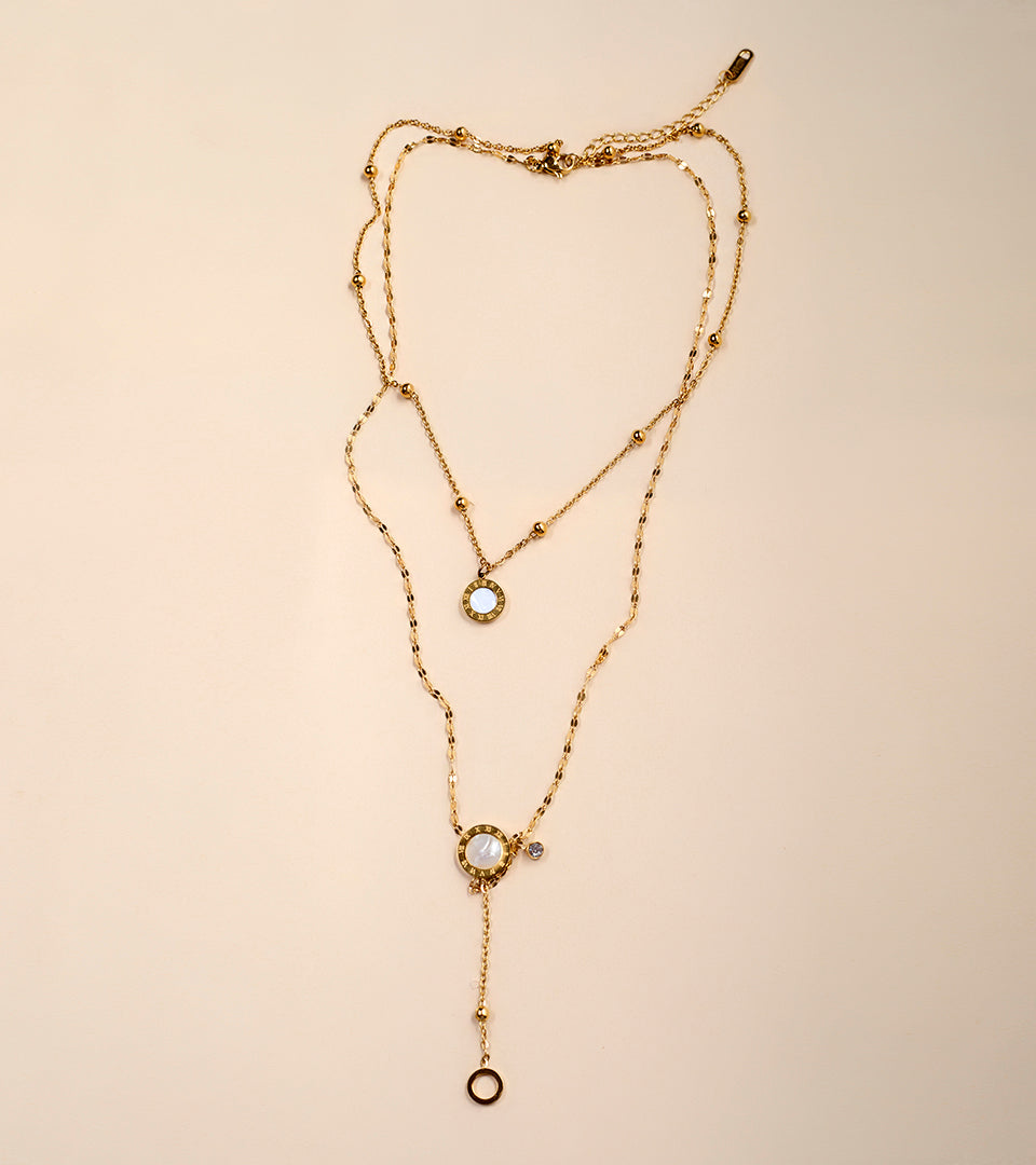 Elegant Roman Numeral Layered Necklace on black jewellery bust