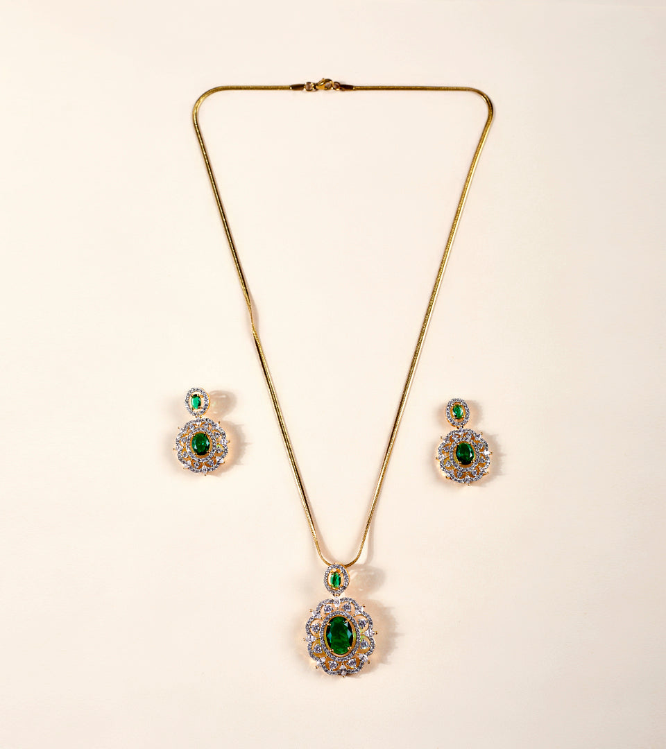 Emerald Green Sunburst CZ Pendant Necklace Set flat lay on white background