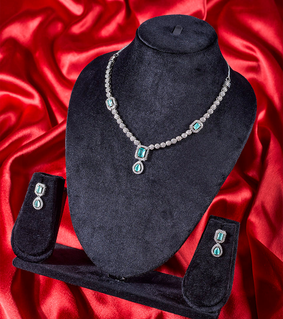 Aqua Blue CZ Necklace and Earrings Set flat lay